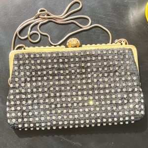 La Regale Vtg evening bag. Black, Gold, & Studded details black Satin inside.